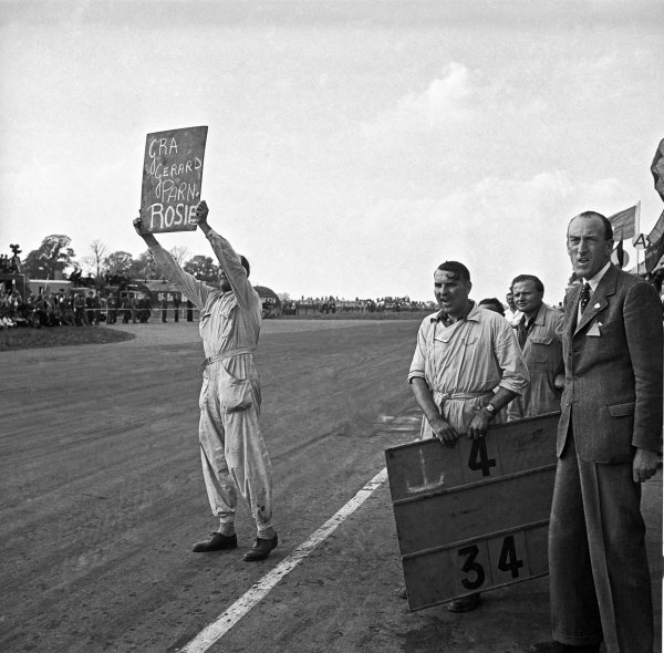 1949 British Grand Prix.
Silverstone, Great Britain. 14 May 1949.
Having retired from the race Louis Chiron, Ecurie France Lago-Talbot T26C, shows the pit board to his team mate, pitlane action.
World Copyright: LAT Photographic
Ref: Autocar glass negative 1949 British Grand Prix.
Silverstone, Great Britain. 14 May 1949.
Having retired from the race Louis Chiron, Ecurie France Lago-Talbot T26C, shows the pit board to his team mate, pitlane action.
World Copyright: LAT Photographic
Ref: Autocar glass negative