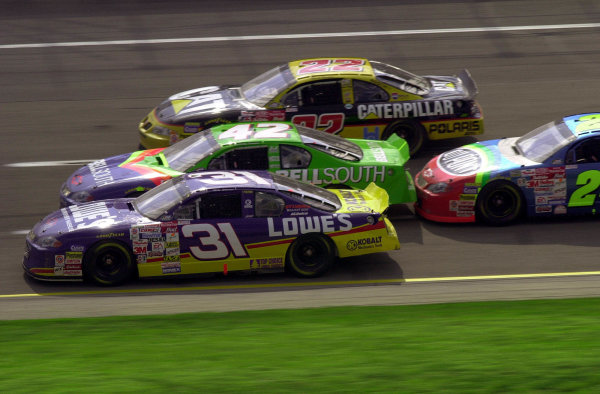 Second place finisher Mike Skinner leads Kenny Irwin (#42, 4th), Ward Burton (#22,10th) and eventual winner Jeff Gordon through the tri-oval in the closing laps of the race.
NASCAR DieHard 500 at Talladega Superspeedway 16 April,2000 LAT PHOTOGRAPHIC
-F
Peirce Williams 2000

