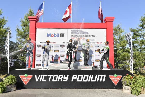 #33 Riley Motorsports Mercedes AMG GT3, GTD: Jeroen Bleekemolen, Ben Keating celebrates the win in Victory Lane on the podium with #14 3GT Racing Lexus RCF GT3, GTD: Dominik Baumann, Kyle Marcelli, #44 Magnus Racing Audi R8 LMS GT3, GTD: John Potter, Andy Lally #33 Riley Motorsports Mercedes AMG GT3, GTD: Jeroen Bleekemolen, Ben Keating celebrates the win in Victory Lane on the podium with #14 3GT Racing Lexus RCF GT3, GTD: Dominik Baumann, Kyle Marcelli, #44 Magnus Racing Audi R8 LMS GT3, GTD: John Potter, Andy Lally