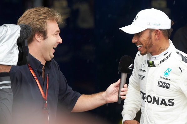 Autodromo Nazionale di Monza, Italy.
Saturday 2 September 2017.
Lewis Hamilton, Mercedes AMG, is interviewed by Davide Velsecci after securing his record breaking 69th F1 career pole position.
World Copyright: Steve Etherington/LAT Images 
ref: Digital Image SNE15080