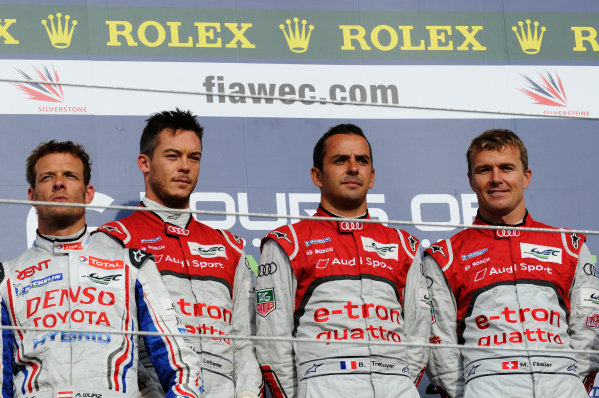 Silverstone, England. 24th - 26th August 2012. Rd 4.
Alexander Wurz, Toyota Racing, Toyota TS030 Hybrid, Andre Lotterer (GER), Marcel Fassler (CHE), Benoit Treluyer (FRA), Audi Sport Team Joest, Audi R18 E-Tron Quatrro, Portrait, Podium, 
World Copyright: Chris Bird/LAT Photographic.
Ref:  _CJB8567