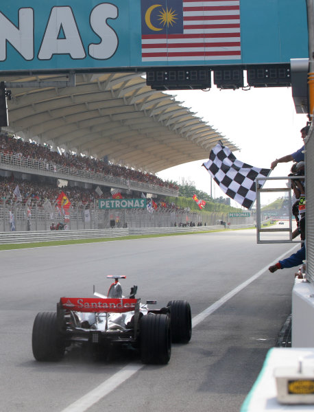 Sepang, Kuala Lumpur, Malaysia.
8th April 2007
Fernando Alonso, McLaren MP4-22 Mercedes, 1st position, crosses the line to take his first victory with the McLaren team. Action. Finish.
World Copyright: Steve Etherington/LAT Photographic
ref: Digital Image WI2T1202 Sepang, Kuala Lumpur, Malaysia.
8th April 2007
Fernando Alonso, McLaren MP4-22 Mercedes, 1st position, crosses the line to take his first victory with the McLaren team. Action. Finish.
World Copyright: Steve Etherington/LAT Photographic
ref: Digital Image WI2T1202