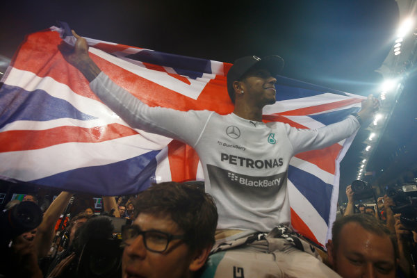 Yas Marina Circuit, Abu Dhabi, United Arab Emirates.
Sunday 23 November 2014.
Lewis Hamilton, Mercedes AMG, 1st Position, celebrates 2014 title success with his team.
World Copyright: Andy Hone/LAT Photographic.
ref: Digital Image _ONY2520 Yas Marina Circuit, Abu Dhabi, United Arab Emirates.
Sunday 23 November 2014.
Lewis Hamilton, Mercedes AMG, 1st Position, celebrates 2014 title success with his team.
World Copyright: Andy Hone/LAT Photographic.
ref: Digital Image _ONY2520