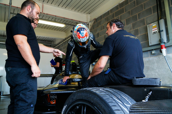 FIA Formula E Season 3 Testing - Day Two.
Donington Park Racecourse, Derby, United Kingdom.
Jean-Eric Vergne, Techeetah, climbs into the cockpit of his Spark-Renault.
Wednesday 24 August 2016.
Photo: Adam Warner / LAT / FE.
ref: Digital Image _14P2900
