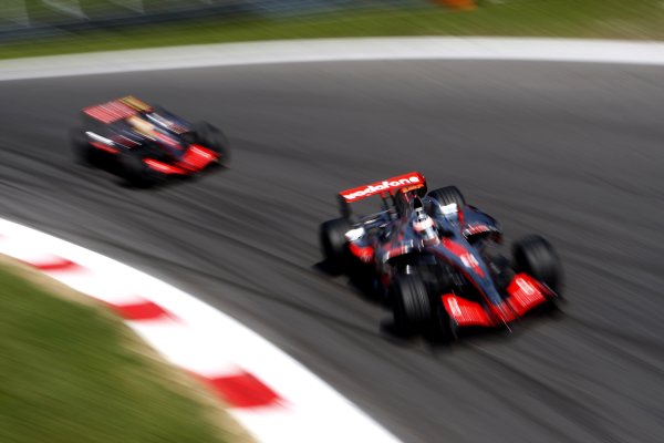 2007 Italian Grand Prix
Autodromo di Monza, Monza, Italy.
7th - 9th September 2007.
Fernando Alonso, McLaren MP4-22 Mercedes leads Lewis Hamilton, McLaren MP4-22 Mercedes at the Parabolica. Action.
World Copyright: Lorenzo Bellanca/LAT Photographic
ref: Digital Image _64I6737