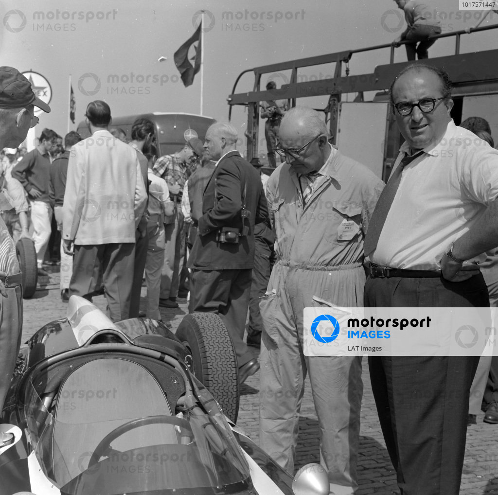 Ferrari designer, Carlo Chiti stands with his hands on his hips ...