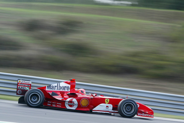 2004 Hungarian Grand Prix-Sunday Race,
Hungaroring, Hungary.
15th August 2004.
Michael Schumacher, Ferrari F2004, action.
World Copyright LAT Photographic/Lorenzo Bellanca.
Digital Image only (a high res version is available on request).