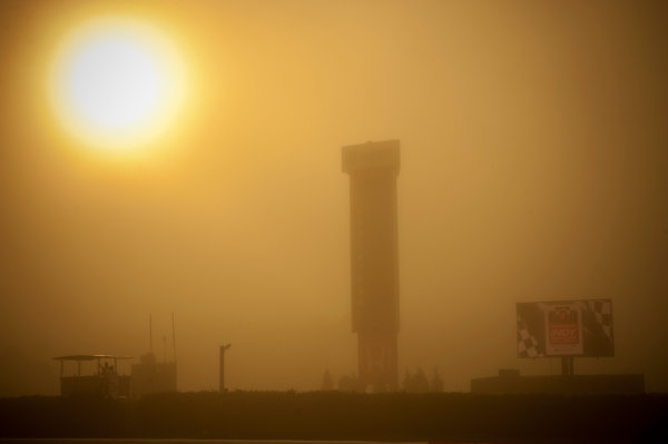 30 March - 1 April, 2012, Birmingham, Alabama USA
The sun begins to cut through the early morning fog over Barber Motorsports Park.
(c)2012, F. Peirce Williams
LAT Photo USA

Note: Color temp changed in Photoshop.