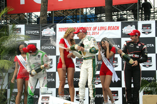 11-13 April, 2014, Long Beach, California USA
Carlos Munoz, Mike Conway, and Will Power celebrate with champagne
©2014, Leland Hill
LAT Photo USA