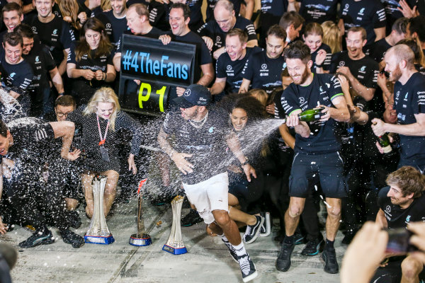 Yas Marina Circuit, Abu Dhabi, United Arab Emirates.
Sunday 26 November 2017.
Valtteri Bottas, Mercedes AMG, 1st Position, Lewis Hamilton, Mercedes AMG, 2nd Position, family, friends and the Mercedes team celebrate victory.
World Copyright: Charles Coates/LAT Images
ref: Digital Image AN7T2740 Yas Marina Circuit, Abu Dhabi, United Arab Emirates.
Sunday 26 November 2017.
Valtteri Bottas, Mercedes AMG, 1st Position, Lewis Hamilton, Mercedes AMG, 2nd Position, family, friends and the Mercedes team celebrate victory.
World Copyright: Charles Coates/LAT Images
ref: Digital Image AN7T2740