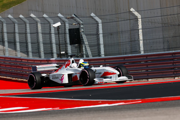 Circuit of the Americas, Austin, Texas, United States of America.
Saturday 21 October 2017.
Zsolt Baumgartner drives a lap with passenger Charlotte Perkins of the Susan G. Komen cancer charity, in the 2 seat F1 Experience car.
World Copyright: Sam Bloxham/LAT Images 
ref: Digital Image _W6I7546