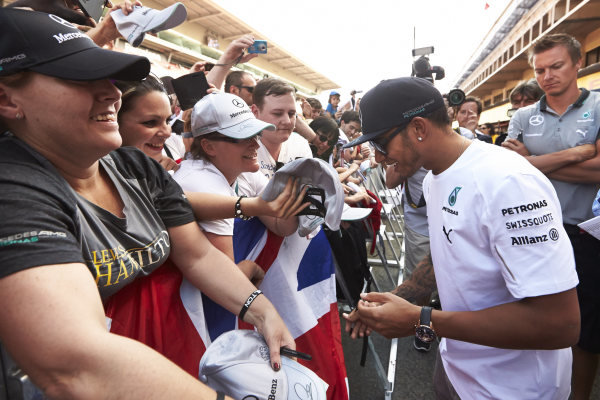 Circuit de Catalunya, Barcelona, Spain.
Thursday 8 May 2014.
Lewis Hamilton, Mercedes AMG, signs autographs for fans.
World Copyright: Steve EtheringtonLAT Photographic.
ref: Digital Image SNE11697 copy