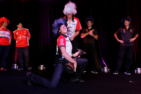 Homebush Street Circuit, Sydney, New South Wales.
4th - 5th December 2010.
Championship leader James Courtney tries his hand at a bit of air guitar in the lead up to  the Sydney Telstra 500 Grand Finale.
World Copyright: Mark Horsburgh/LAT Photographic
ref: Digital Image V8Supercars00003