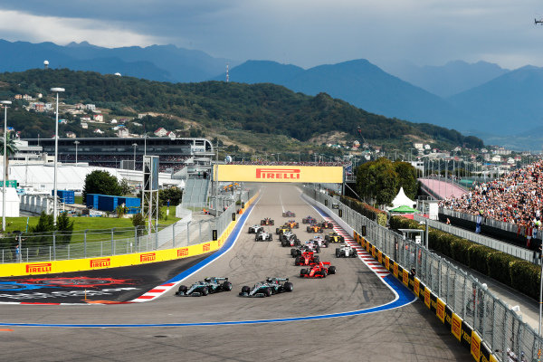 Valtteri Bottas, Mercedes AMG F1 W09 EQ Power+, leads Lewis Hamilton, Mercedes AMG F1 W09 EQ Power+, Sebastian Vettel, Ferrari SF71H, Kimi Raikkonen, Ferrari SF71H, Kevin Magnussen, Haas F1 Team VF-18, Charles Leclerc, Sauber C37 Ferrari, and the rest of the field at the start of the race