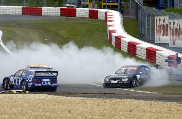 2002 DTM Championship
Nurburgring, Germany. 2th - 4th August 2002.
Jean Alesi (Mercedes CLK-DTM) spins into the tyre wall after colliding with Alain Menu (Opel Astra V8 Coupe), action.
World Copyright: Andre Irlmeier/LAT Photographic
2002 DTM Championship
Nurburgring, Germany. 2th - 4th August 2002.
Jean Alesi (Mercedes CLK-DTM) spins into the tyre wall after colliding with Alain Menu (Opel Astra V8 Coupe), action.
World Copyright: Andre Irlmeier/LAT Photographic