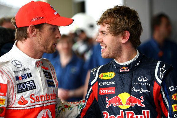 Interlagos, Sao Paulo, Brazil
26th November 2011
Jenson Button, McLaren MP4-26 Mercedes, with Sebastian Vettel, Red Bull Racing RB7 Renault. Portrait. 
World Copyright: Andy Hone/LAT Photographic
ref: Digital Image CSP29754