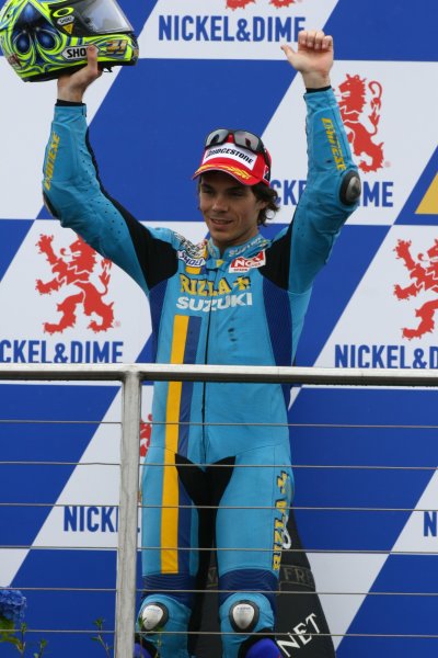 2007 Moto GP British Grand Prix.
Donington Park, England.
22nd-24th June 2007.
Chris Vermeulen (Rizla Suzuki Moto GP, Suzuki GSV-R XRG0) celebrates 3rd position on the podium, portrait.
World Copyright: Kevin Wood/LAT Photographic
ref: Digital Image IMG_6397