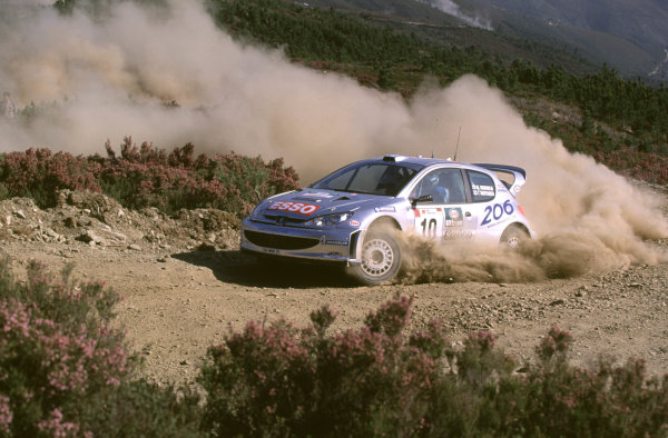 FIA World Rally Championship
Portuguese Rally, Porto, Portugal.
16-19th March 2000.
Marcus Gronholm and Timo Rautianen (Peugeot) action.
World - LAT Photographic
Tel: +44 (0) 181 251 3000
Fax: +44 (0) 181 251 3001
e-mail: latdig@dial.pipex
com
FIA World Rally Championship
Portuguese Rally, Porto, Portugal.
16-19th March 2000.
Marcus Gronholm and Timo Rautianen (Peugeot) action.
World - LAT Photographic
Tel: +44 (0) 181 251 3000
Fax: +44 (0) 181 251 3001
e-mail: latdig@dial.pipex
com