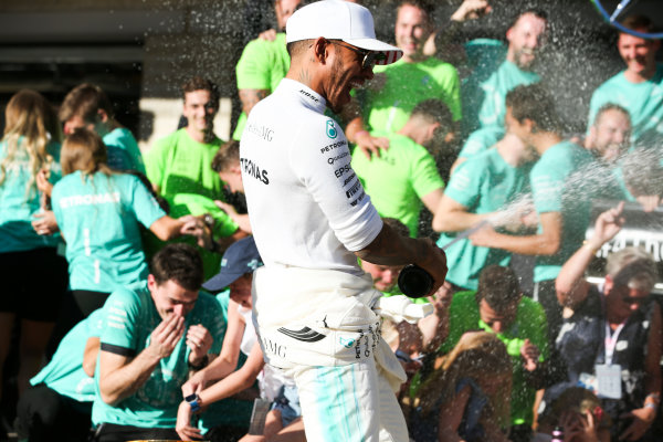 Circuit of the Americas, Austin, Texas, United States of America.
Sunday 22 October 2017.
Lewis Hamilton, Mercedes AMG, 1st Position, celebrates winning the race and the Constructors title, with his team.
World Copyright: Charles Coates/LAT Images 
ref: Digital Image AN7T2417