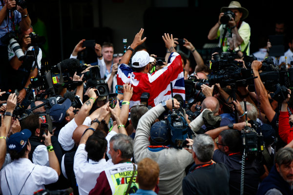 Autodromo Hermanos Rodriguez, Mexico City, Mexico.
Sunday 29 October 2017.
Lewis Hamilton, Mercedes AMG, celebrates his 4th world drivers championship title in front of a large crowd of photographers.
World Copyright: Andy HoneLAT Images
ref: Digital Image _ONZ2637 Autodromo Hermanos Rodriguez, Mexico City, Mexico.
Sunday 29 October 2017.
Lewis Hamilton, Mercedes AMG, celebrates his 4th world drivers championship title in front of a large crowd of photographers.
World Copyright: Andy HoneLAT Images
ref: Digital Image _ONZ2637