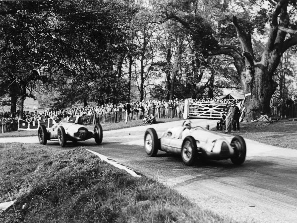 Donington Park, Great Britain.
22 October 1938.
Hermann Muller (Auto Union D-typ) leads Dick Seaman (Mercedes-Benz W154). They finished in 4th and 3rd positions respectively.
Ref-Digital File Only.
World Copyright - LAT Photographic Donington Park, Great Britain.
22 October 1938.
Hermann Muller (Auto Union D-typ) leads Dick Seaman (Mercedes-Benz W154). They finished in 4th and 3rd positions respectively.
Ref-Digital File Only.
World Copyright - LAT Photographic